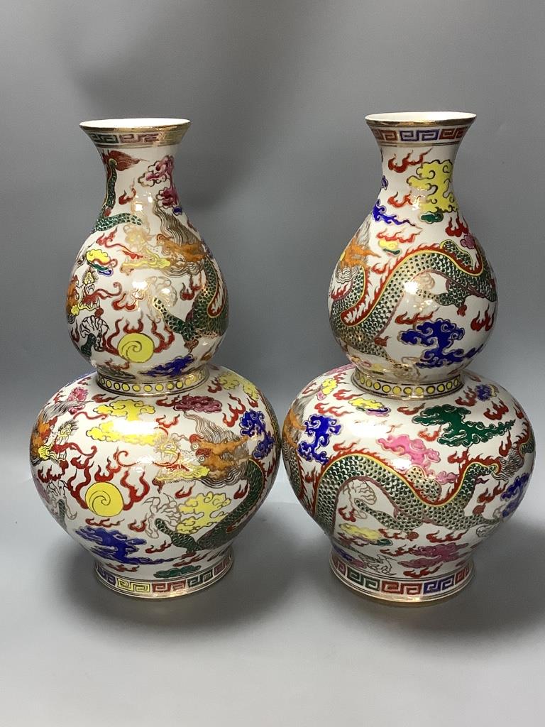 A pair of Chinese famille rose double gourd-shaped vases, height 40cm